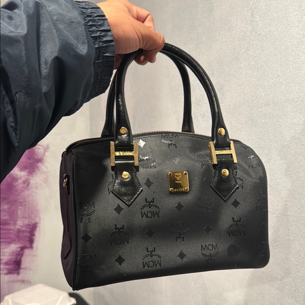 MCM Black Mini Bag with Gold Accents